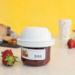 Status, Συσκευή σφράγισης βάζων